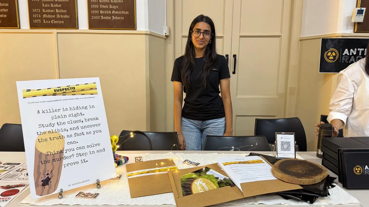 Aastha presenting her Suspecto murder mystery game at an event